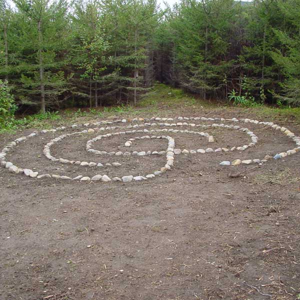 Installation by Irene Anton - stone labyrinth in the forest Labyrinth